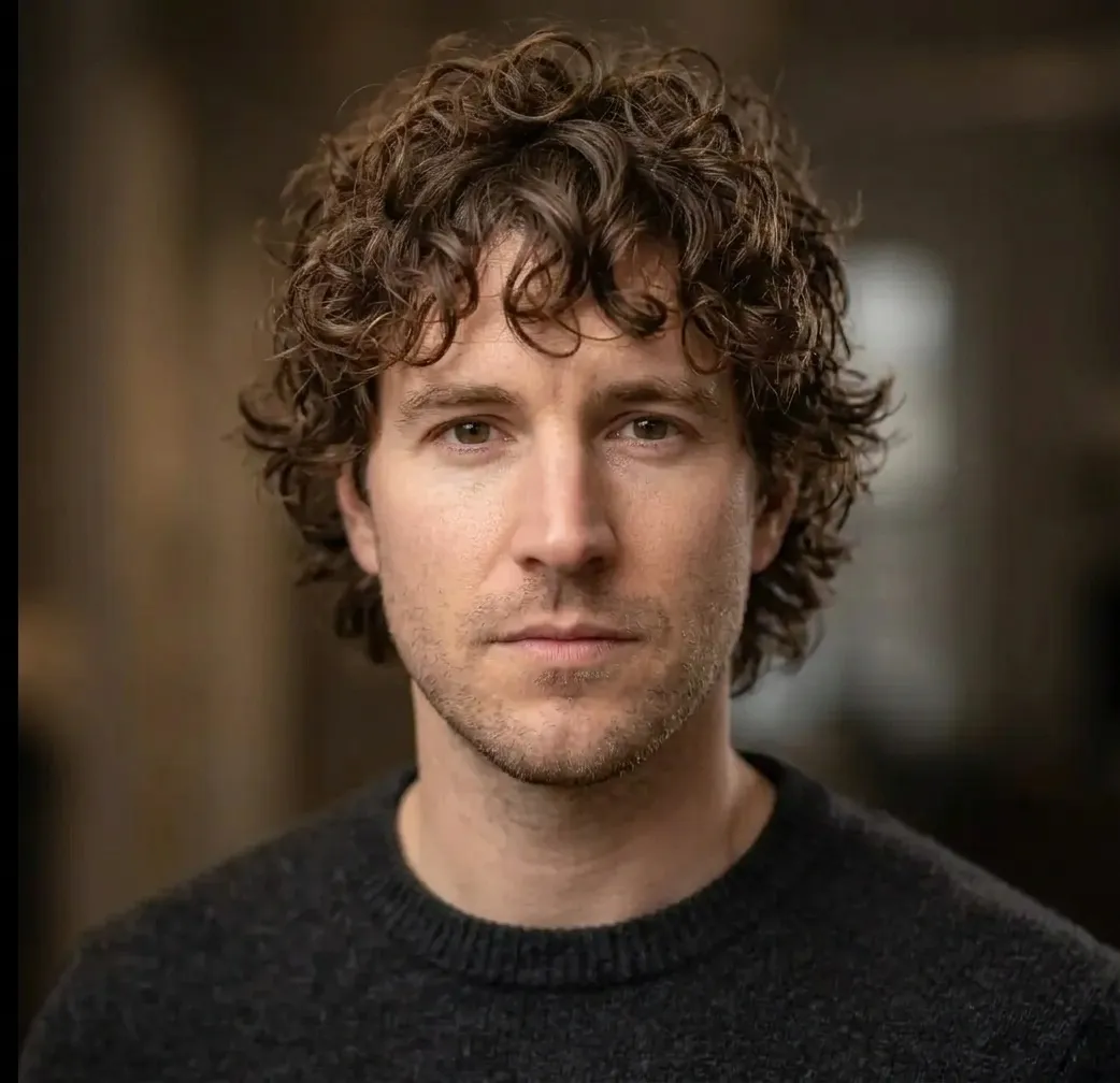Curly Shag Haircut for men — styled finish