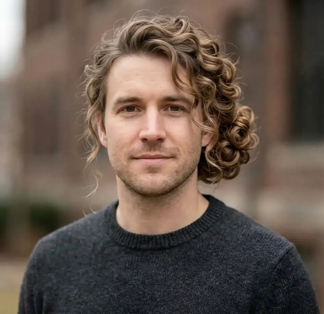 Curly Chignon Updo hairstyle for Men