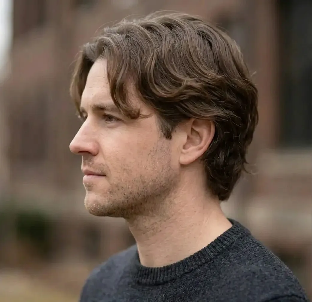 Curtain Bangs Haircut for men — side view