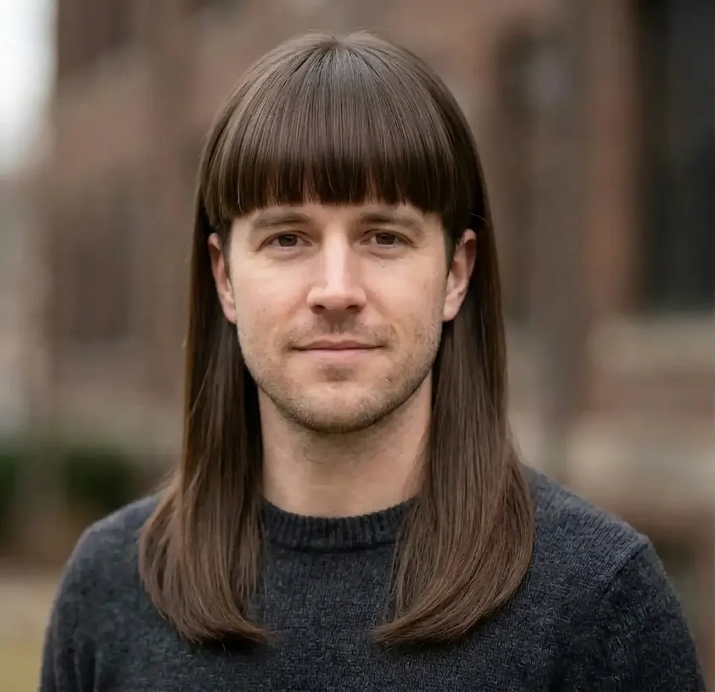 Sleek Fringe Straight hairstyle for Men