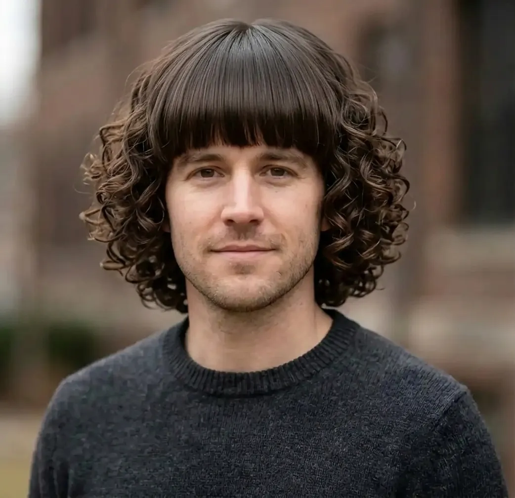 Blunt Fringe Curls hairstyle for Men