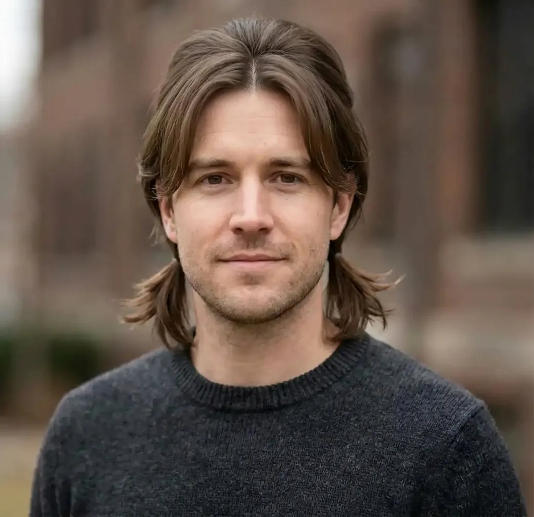 Symmetrical Low Ties hairstyle for Men