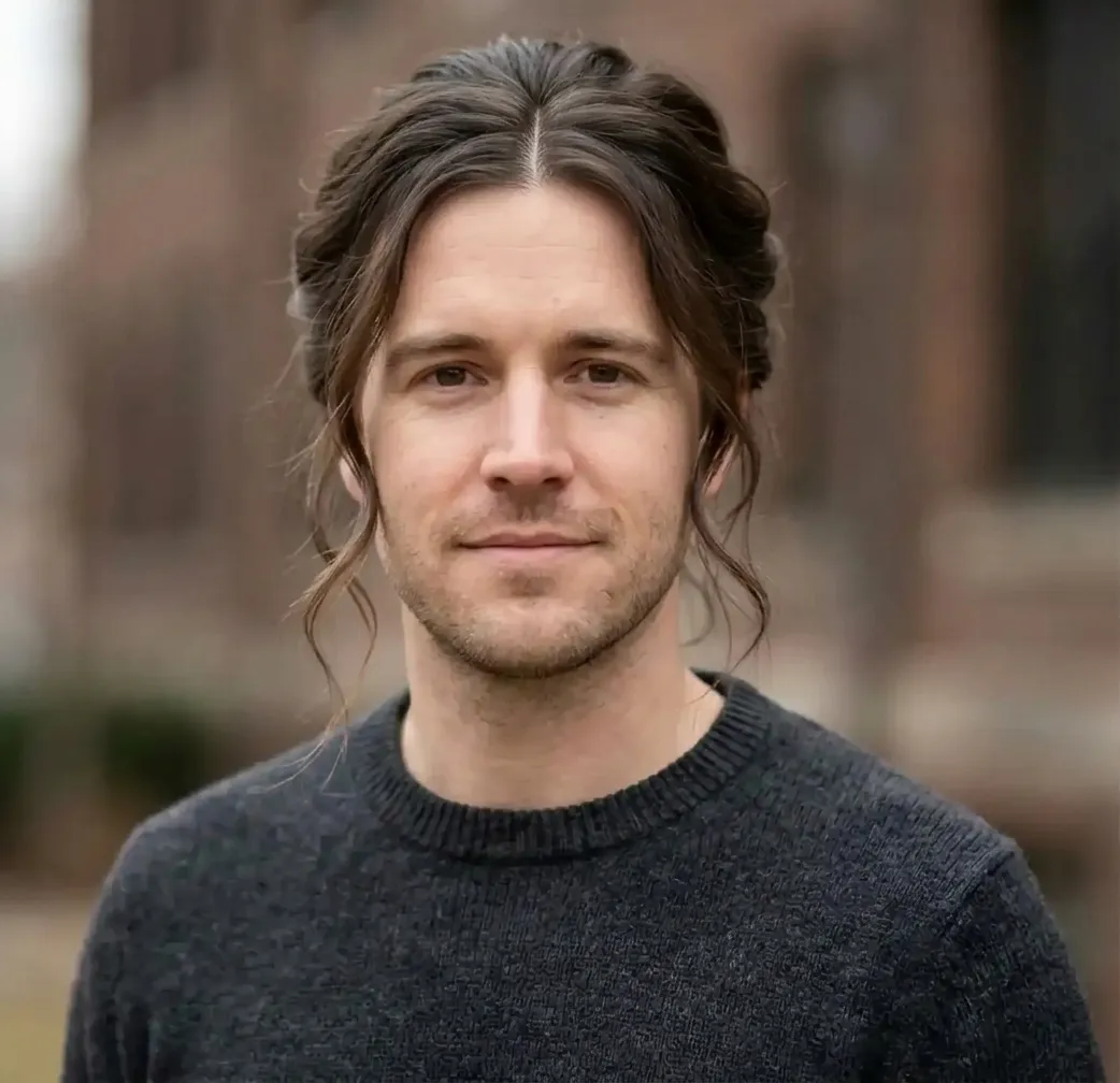 Parted Wispy Updo hairstyle for Men