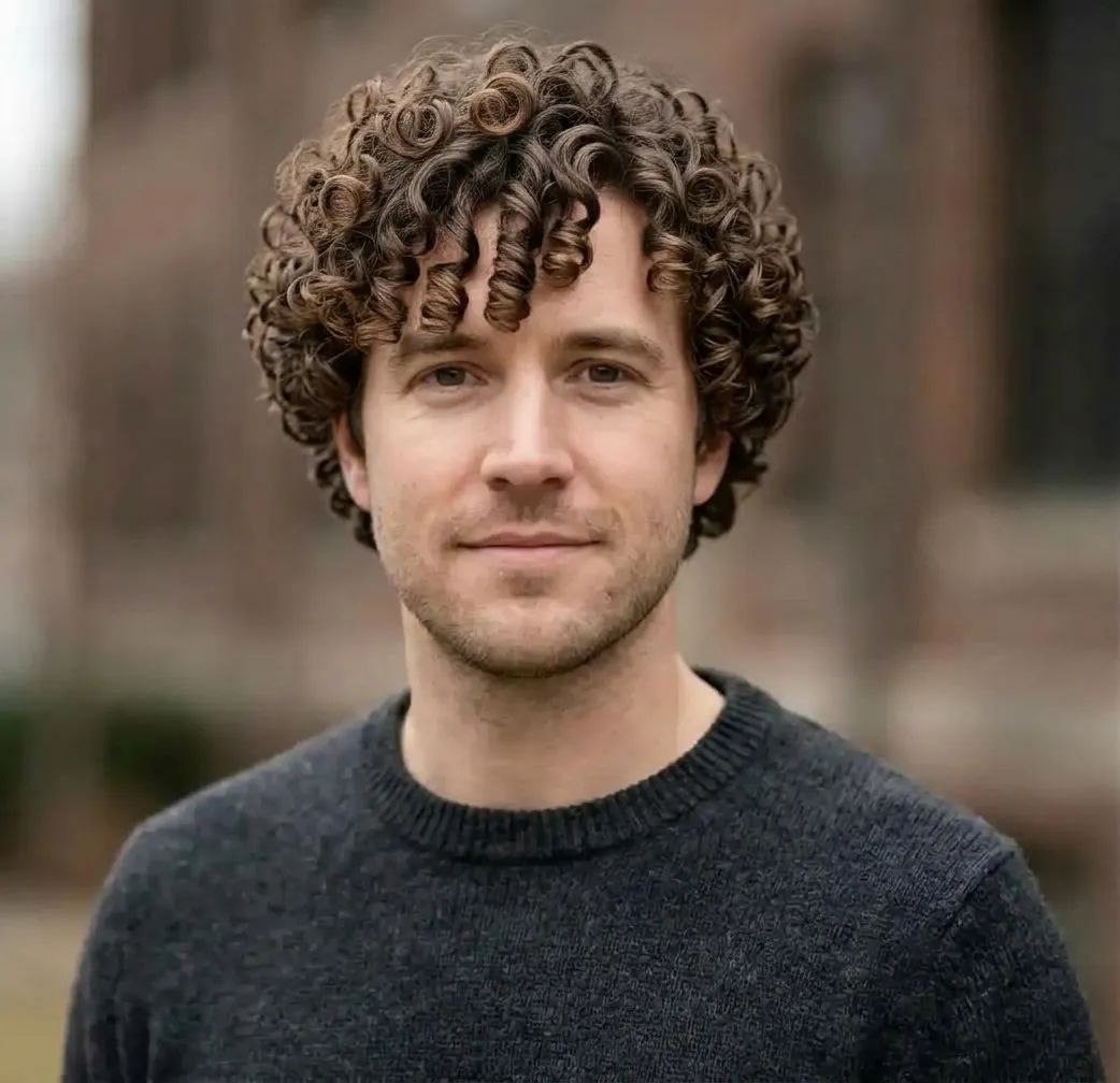 Rounded Coiled Fringe hairstyle for Men