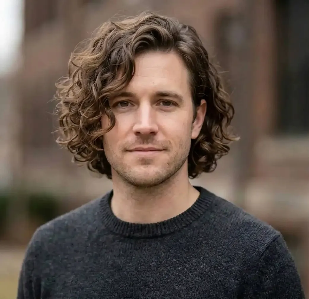 Voluminous Swept Curl hairstyle for Men